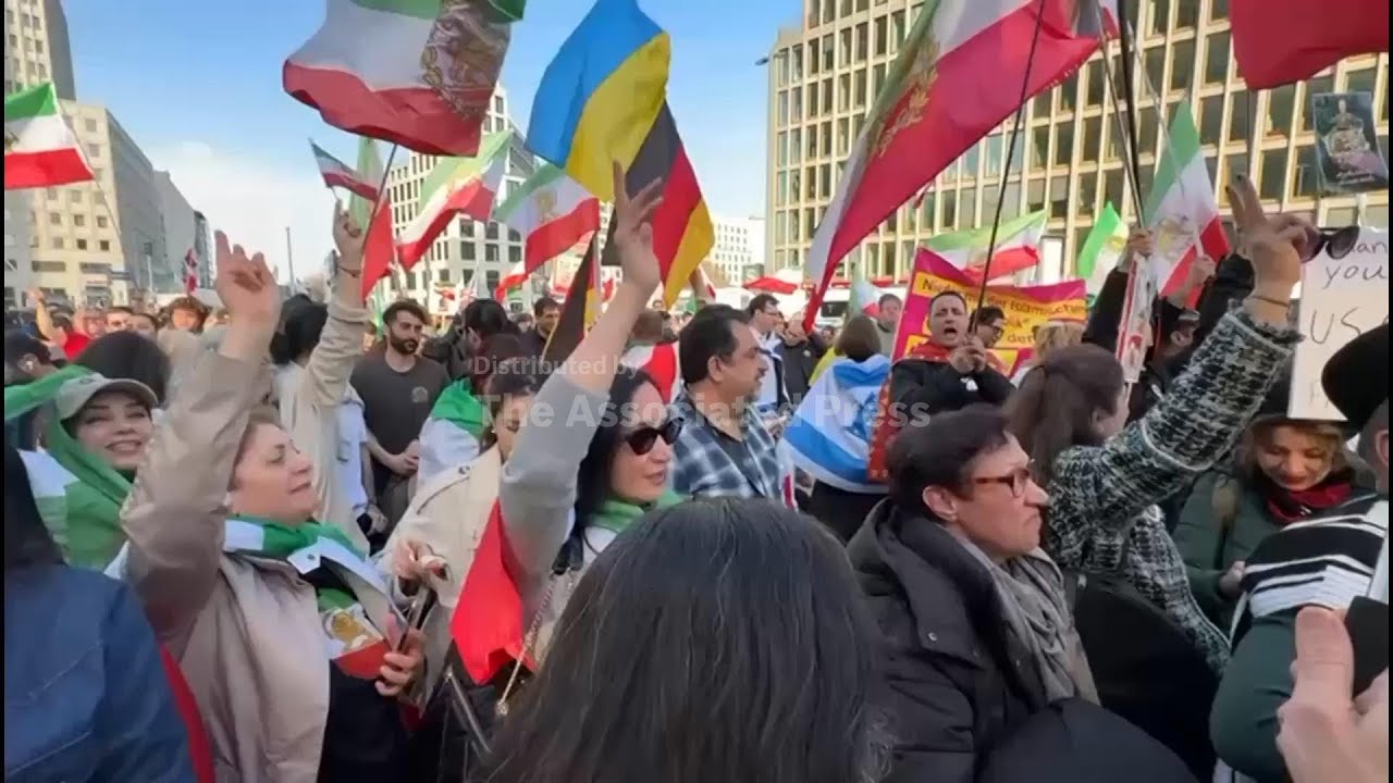 Supporters of Iran's exiled crown prince rally in Berlin, show support for US-Israel strikes