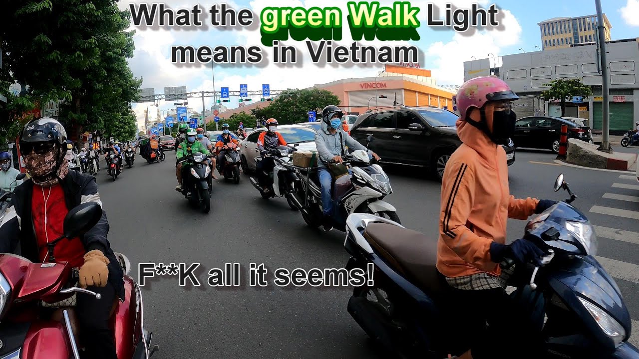 How to cross the road in Saigon Vietnam Traffic