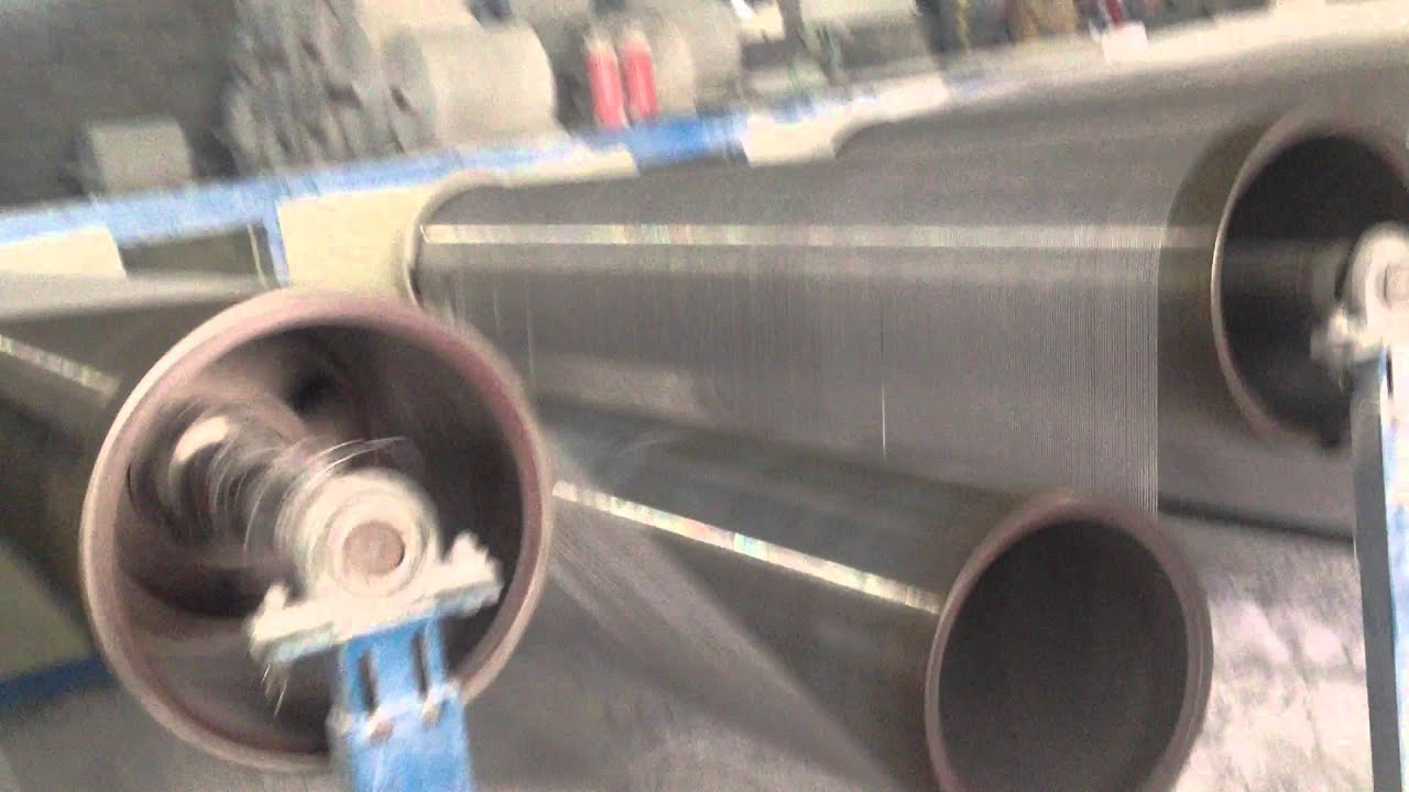 PLASTIC TAPE DRAWING MACHINE