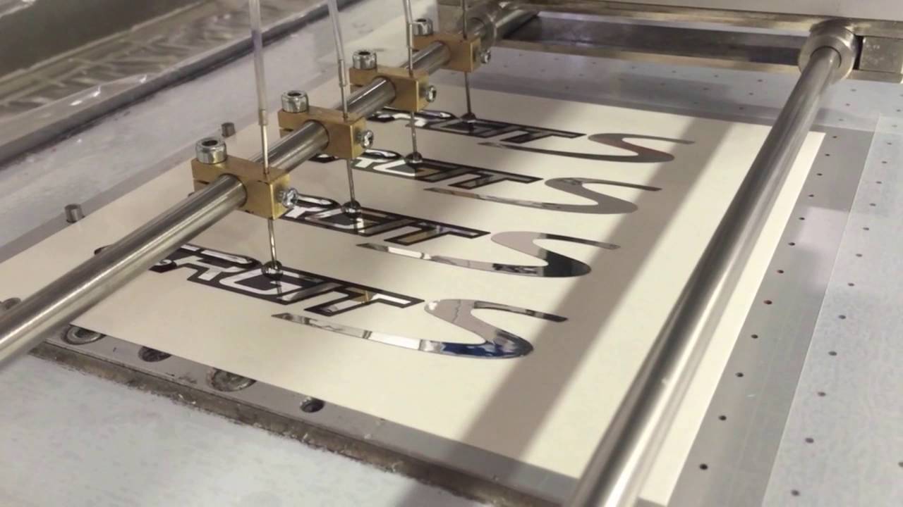 NEW LABEL - Taglio Plotter e Resinatura automatica