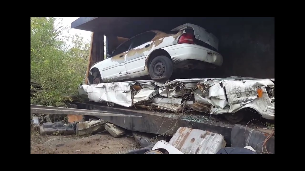 Crushing old Chevy van 