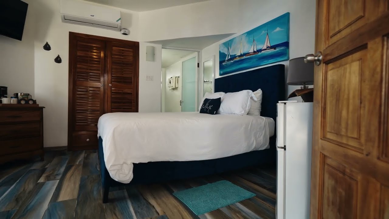 Partial Ocean View Queen with Patio - Blue Skies Beach Resort in Negril, Jamaica