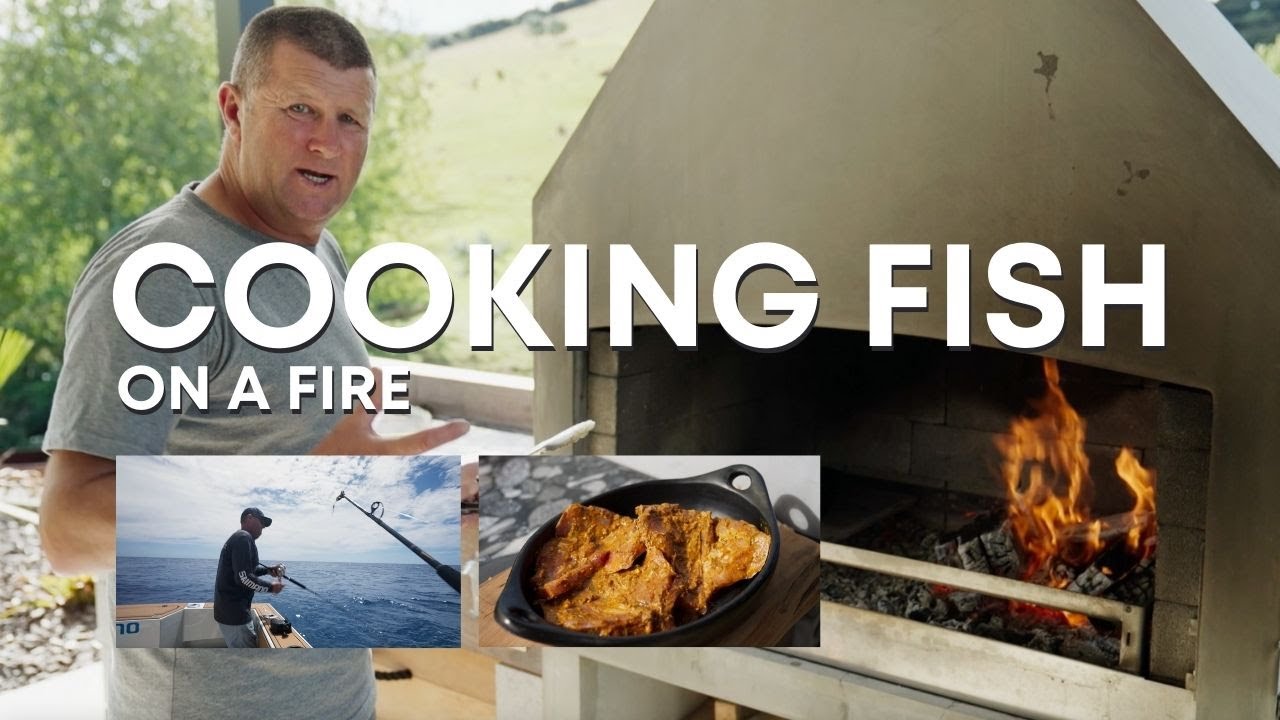 Cooking fish on an outdoor fireplace