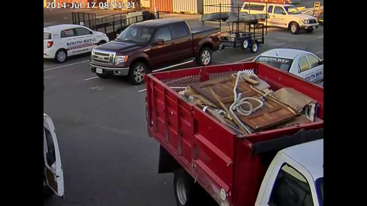 Security Camera Catches Parking Lot Incident (Zoom)