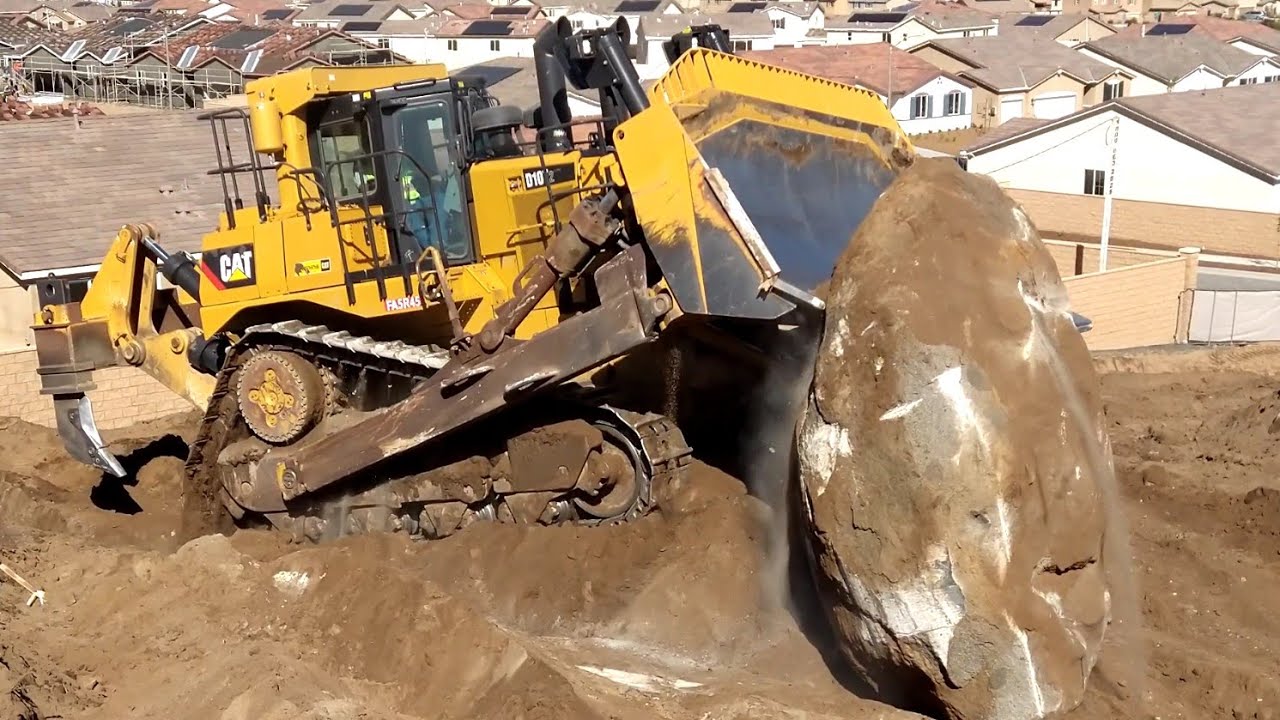 CAT D10T2 Dozer Removing Massive Rock- Amazing Power