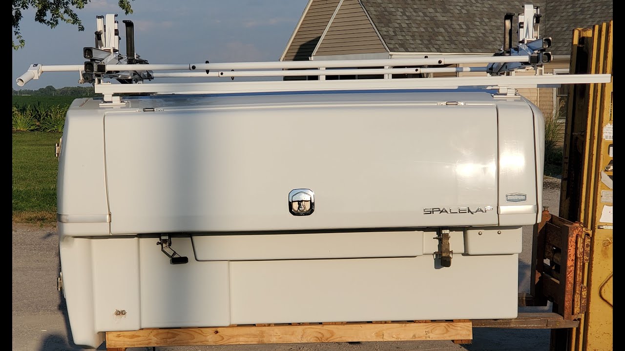 Walkaround used SpaceKap Compak Slide in Truck cap for sale. Fits full size short bed truck 6.5'