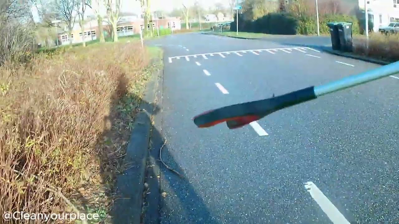 Cleaning rubbish from the street 5225