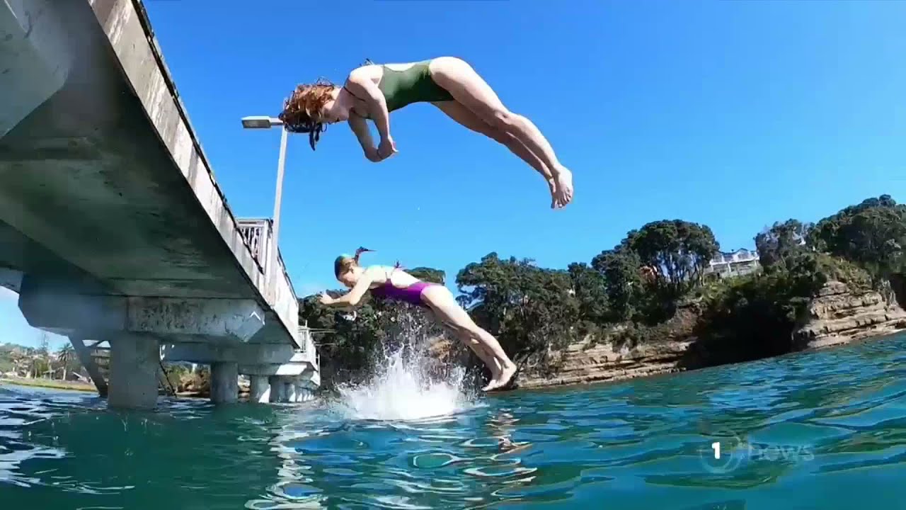 Auckland Diving club members training on the Murrays Bay wharf