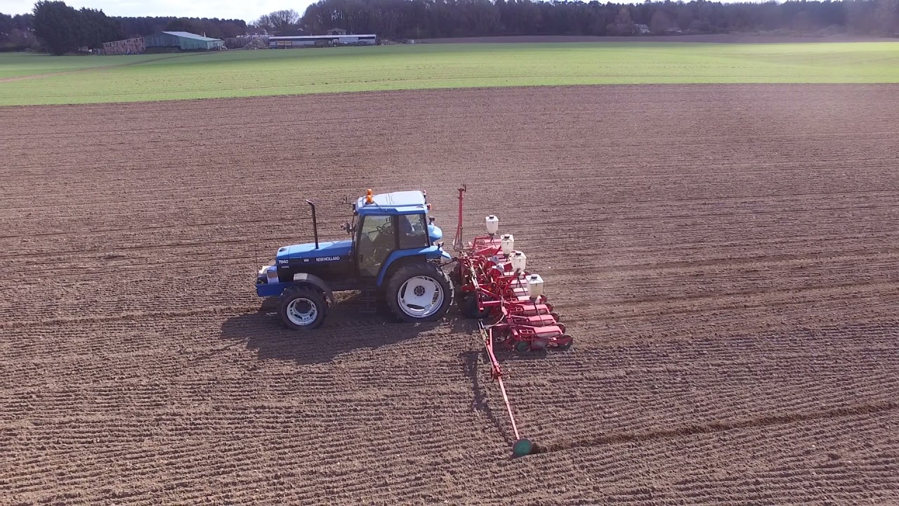 New Holland 7840 drilling beet.