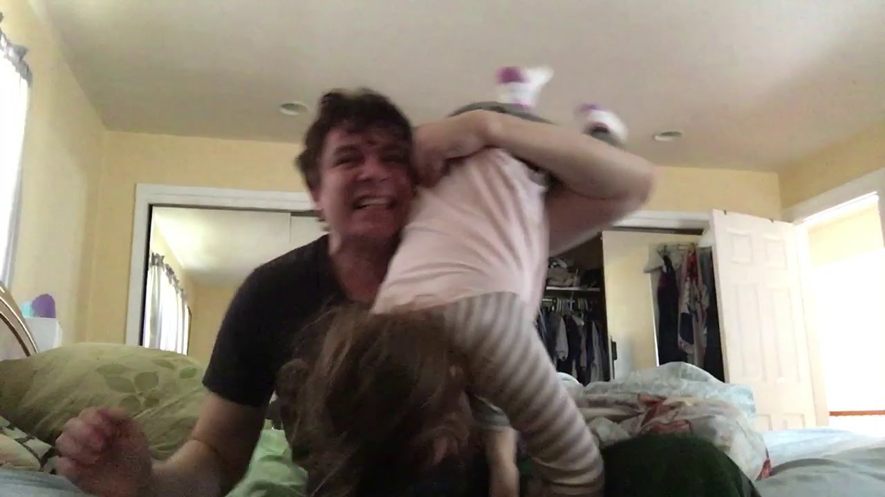 Carolyn and Dad wrestling match!