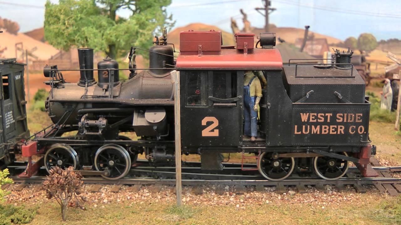 Макет железной дороги в лесу на Диком западе