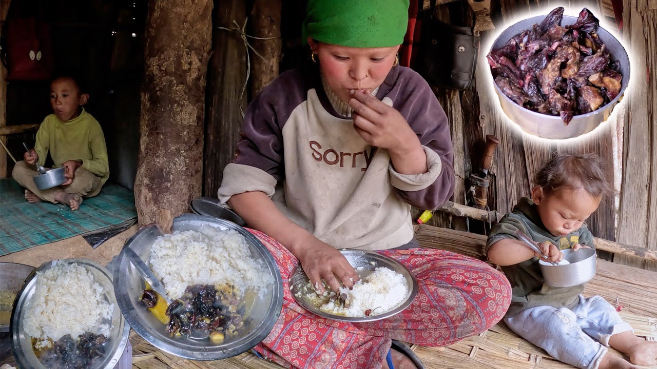 Rita's cooking in her buffalo shed || Life in rural Nepal ||