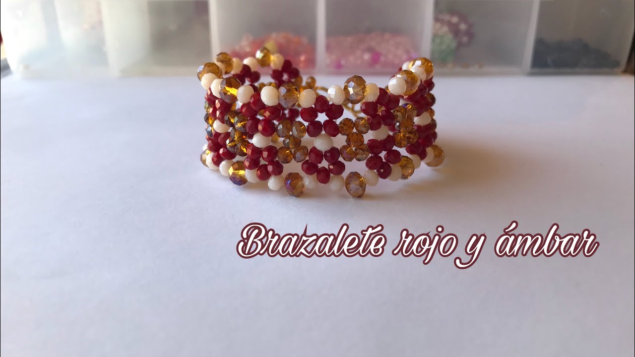 Brazalete rojo y ámbar