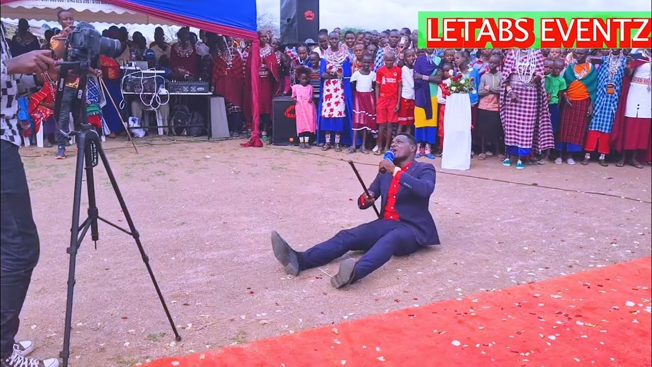 TIMOTHY OPOTI PERFORMING LIVE