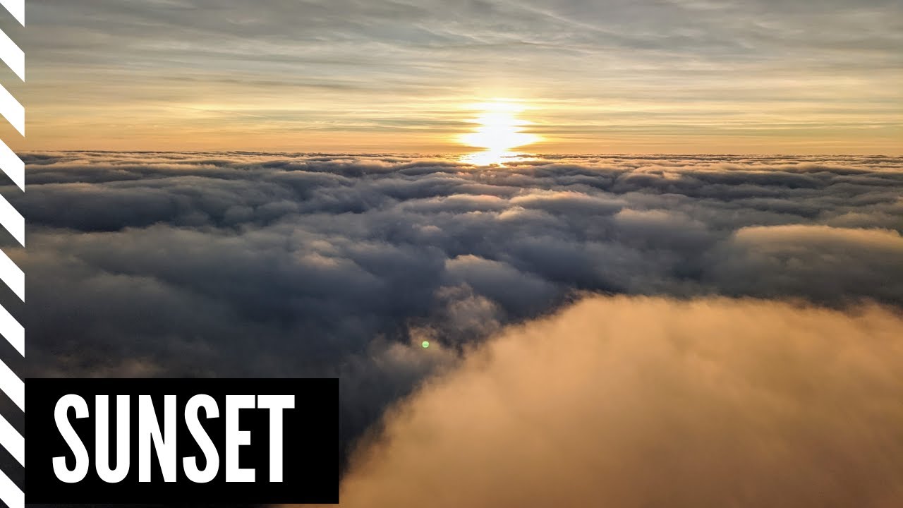 Paramotor flight 104 - sunset over the clouds
