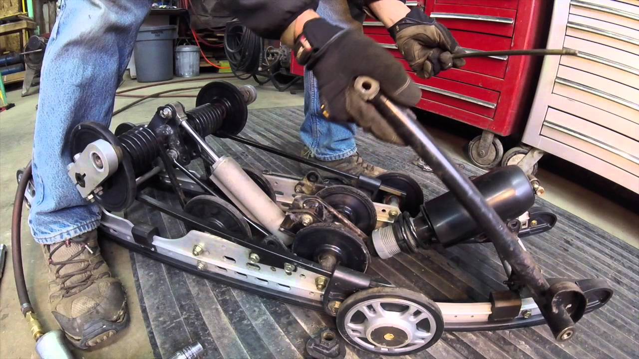Removing front inner idler wheels