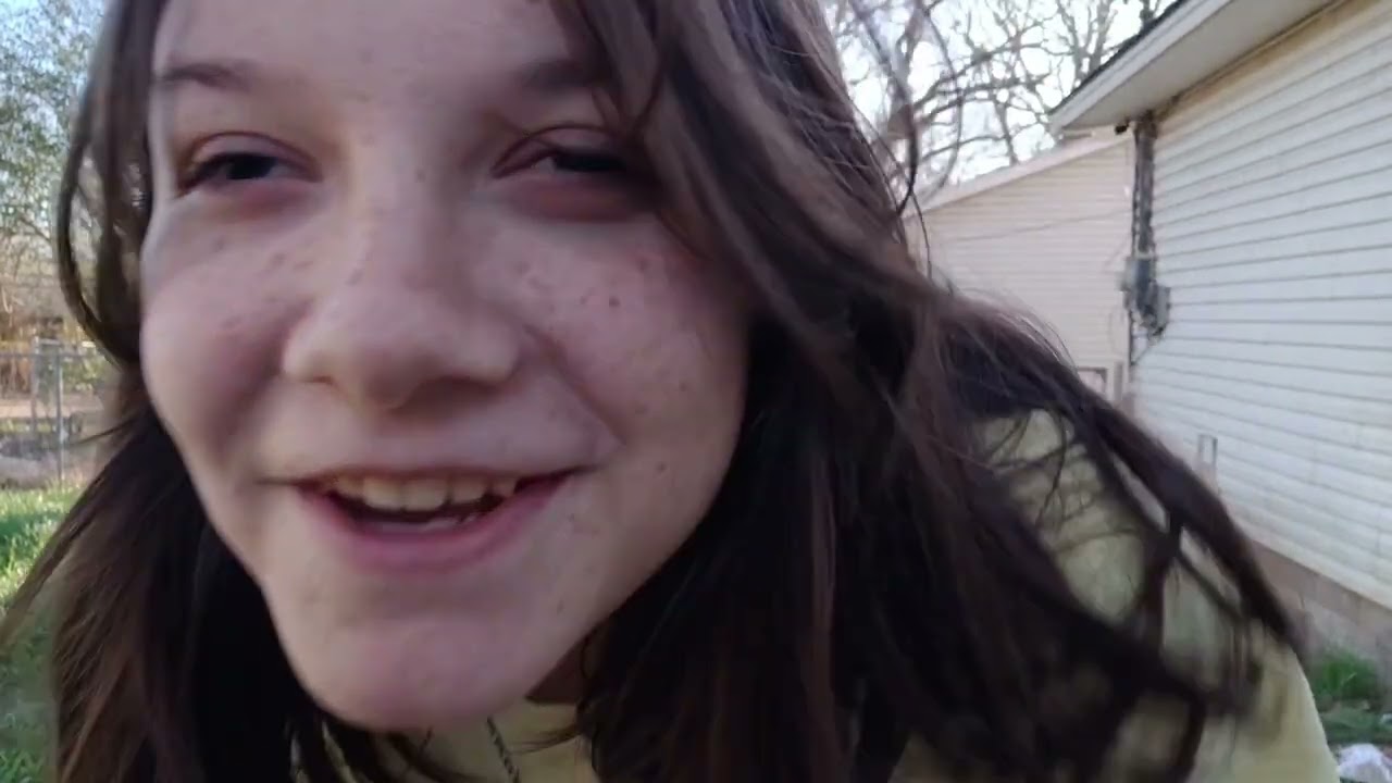 Autumn practicing playing the drums.