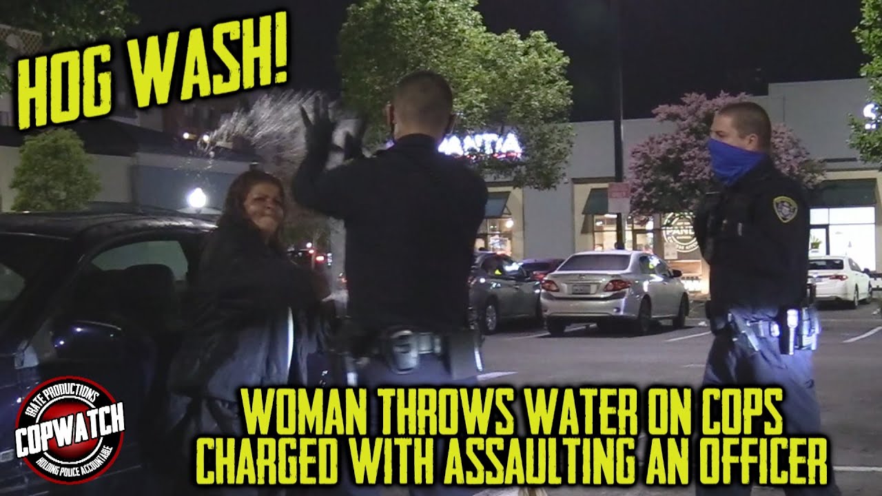 Woman Throws Water on Cops Charged with Assaulting an Officer | Copwatch