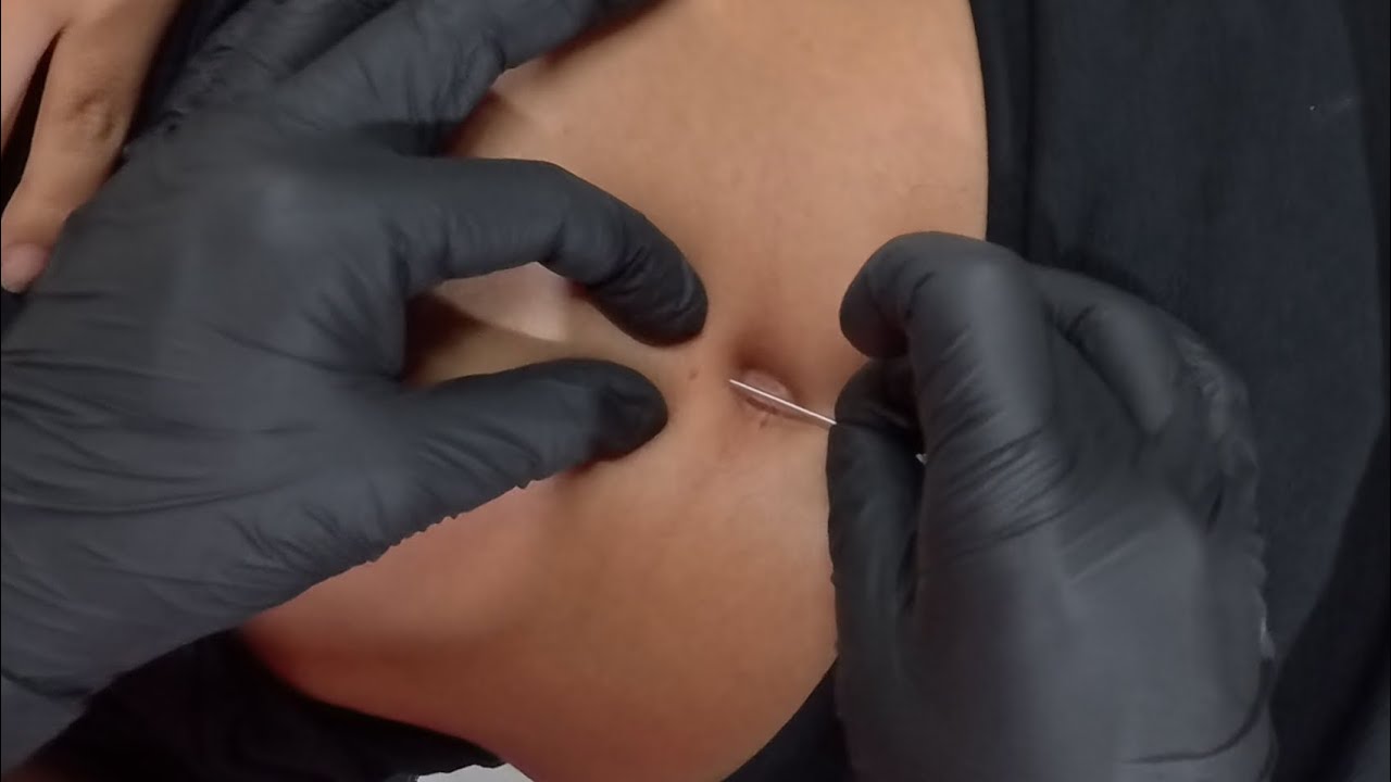Un poco de risa aquí en la elaboración de un arete