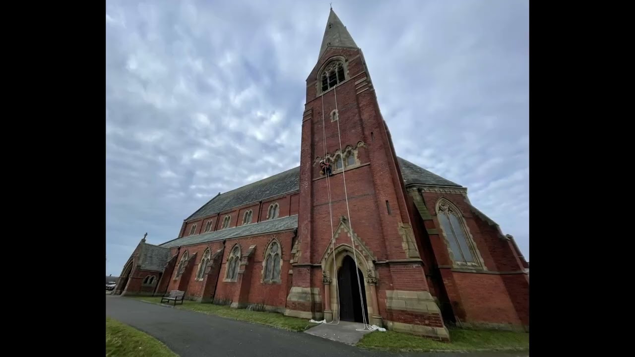 Abseiling and Maintenance Work on the Tower of ST James Barrow IN Furness