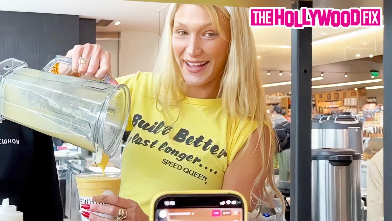 Bella Hadid Goes Undercover As A Grocery Store Employee At Erewhon Market In Santa Monica, CA