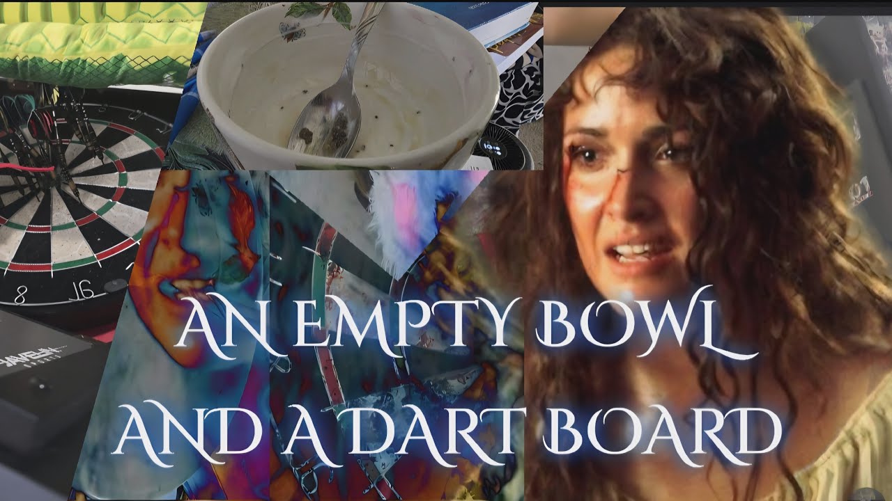 AN EMPTY BOWL AND A DART BOARD