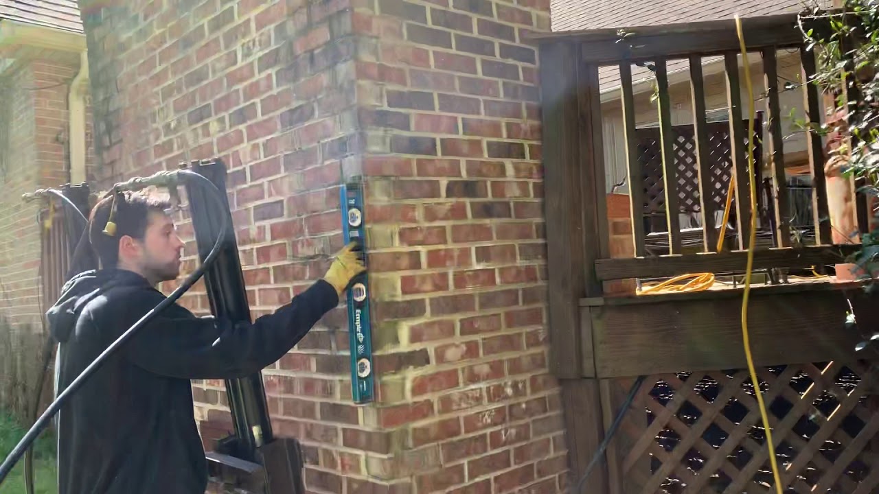 JSA Foundation Repair “How to lift and repair a leaning fireplace outdoors.”