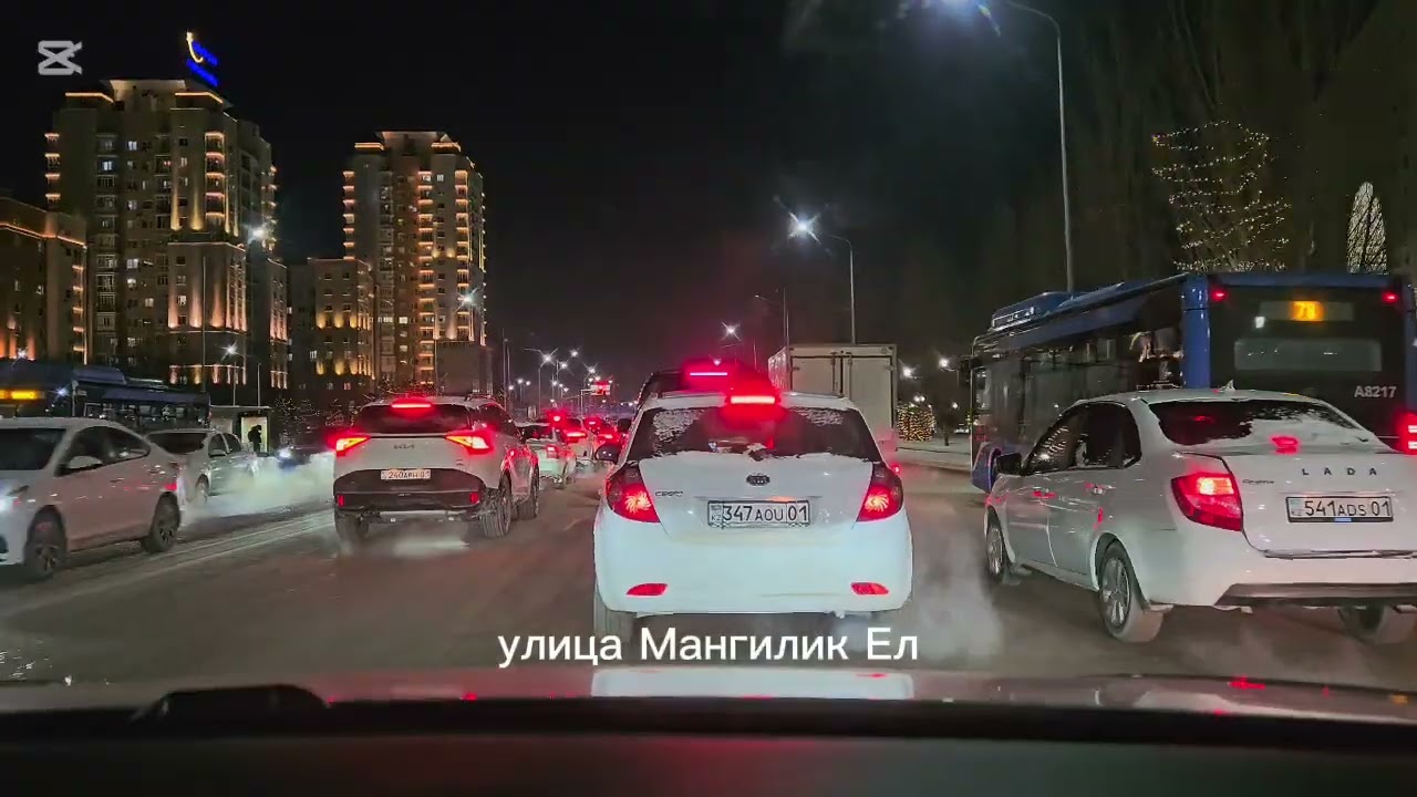 Astana, Feb 2026. Late-evening drive through the streets.