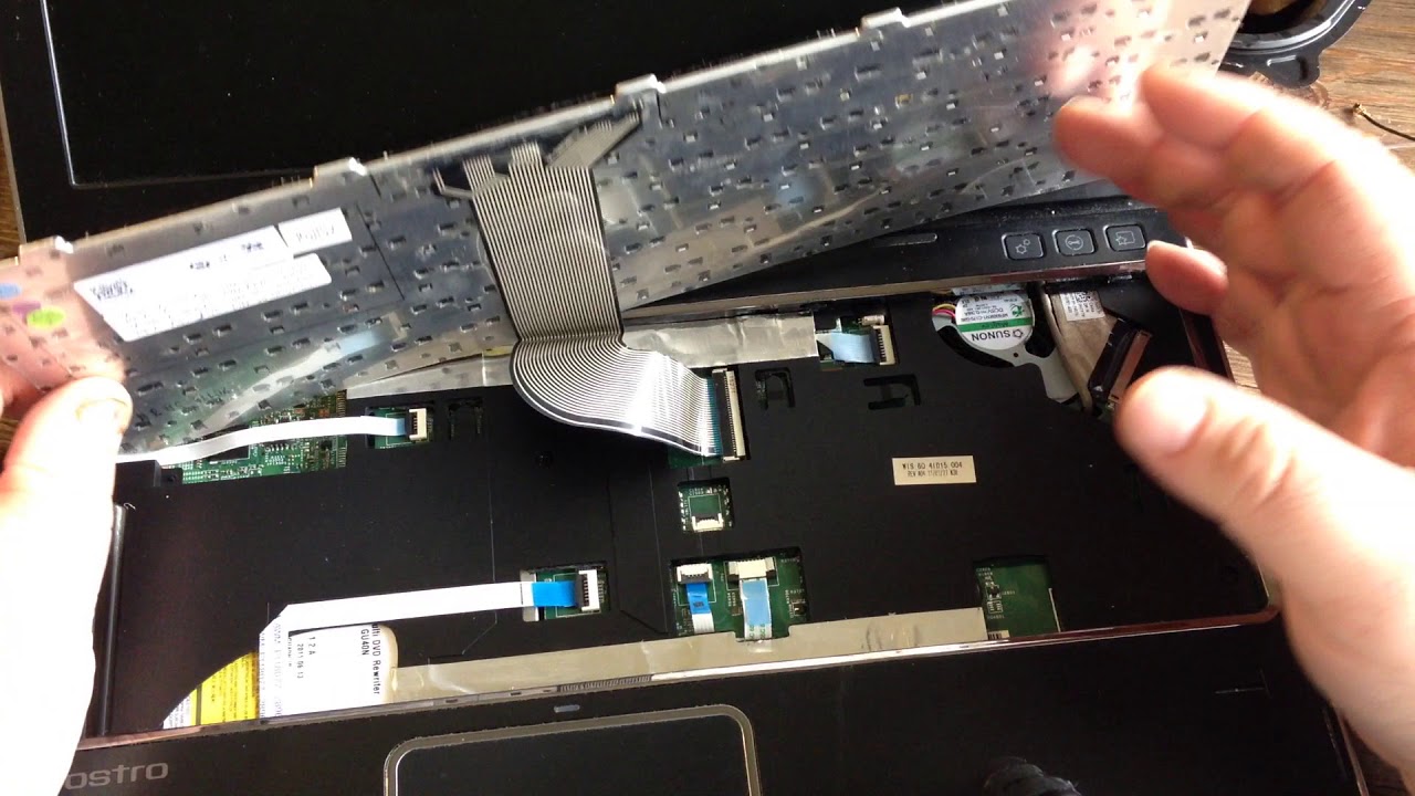 How to remove and install a keyboard in a Dell Vostro 3350