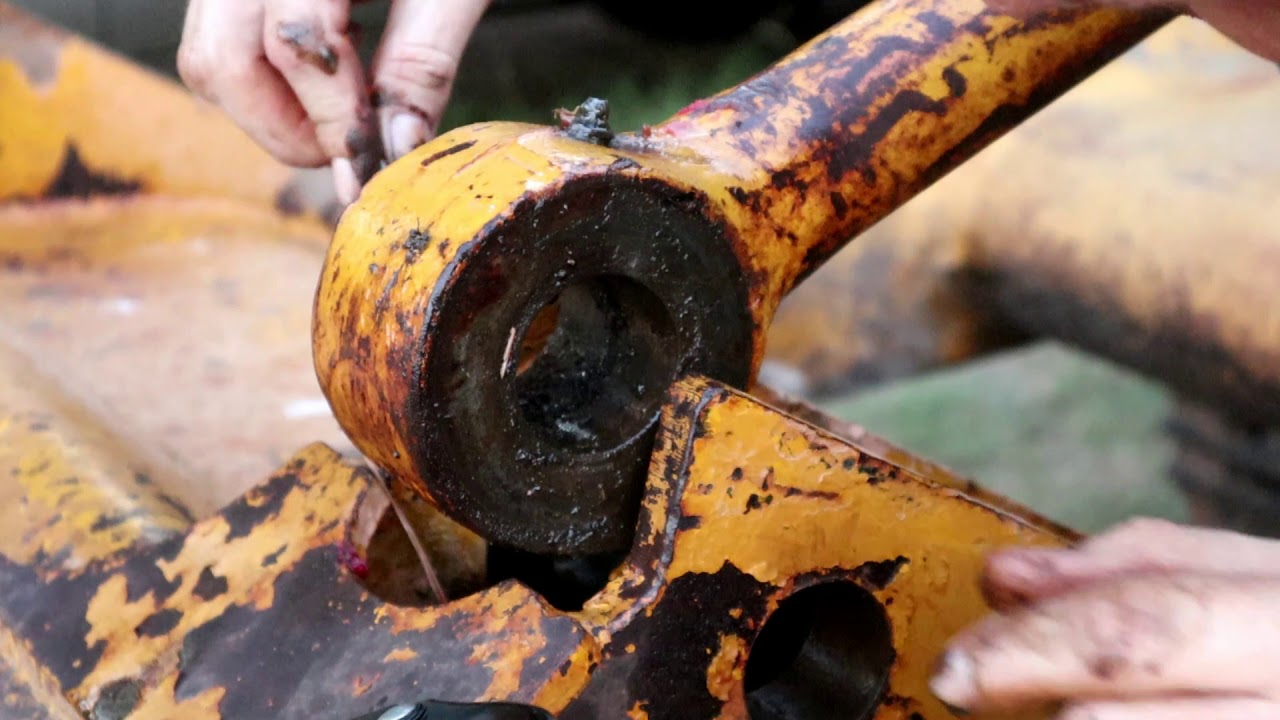 Removing Stuck Caterpillar Bulldozer Pin and Zirk Cleanout Tool Pt1