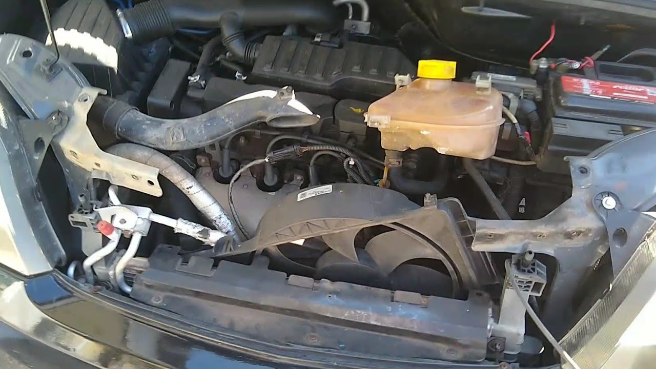 DEFEITO VENTOINHA MERIVA TIRANDO O RADIADOR E TROCANDO OS CARVÕES DO MOTOR ELÉTRICO COMO CONSERTAR