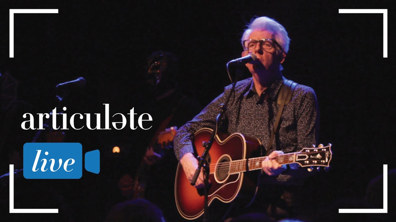 Nick Lowe & Los Straitjackets Play “Blue on Blue”