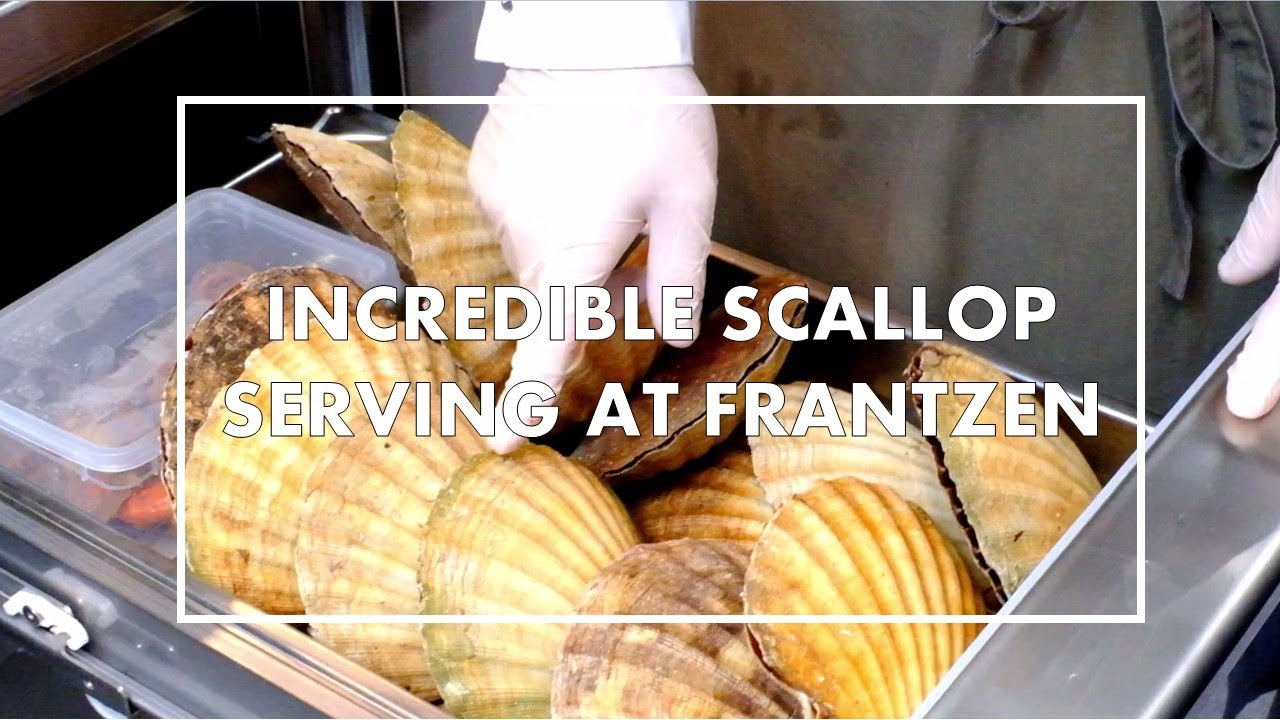 Scallops, salted tomato & plum water serving at Frantzén (3 Michelin stars) in Stockholm