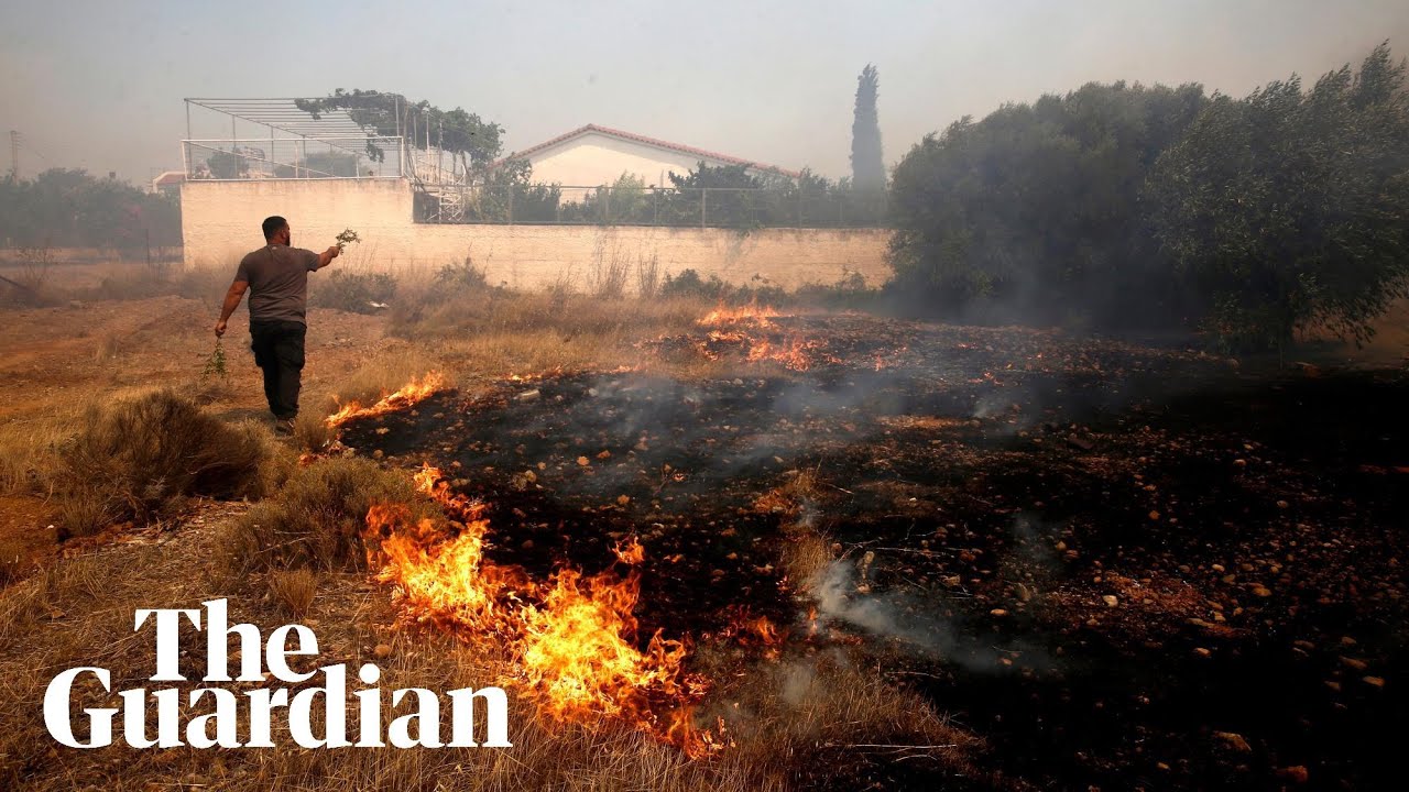 People evacuate homes as wildfire rages south of Greek capital