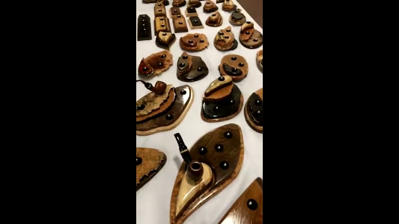 Neal Yarm Showing Off His Beautiful Pipe Stands At The 2018 Chicago Pipe Show