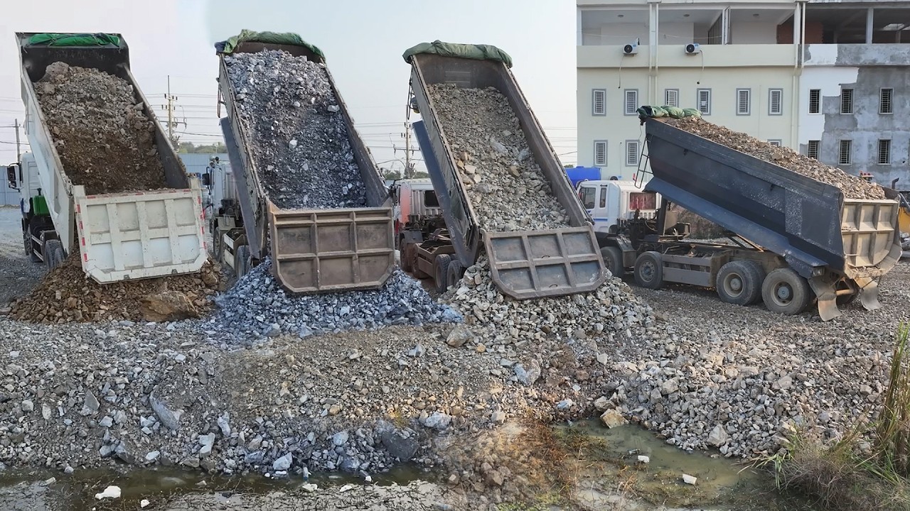 Amazing! ! Project Throwing large rocks into the lake with a dozer