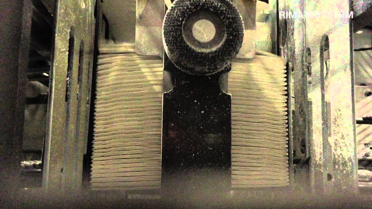 RIMA-SYSTEM Lift Collator RS 700 behind digital web press. Stacking of pre-glued book blocks