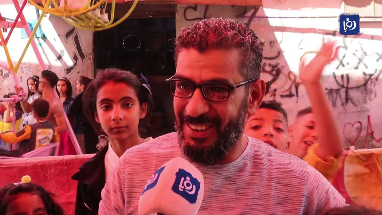 ألعاب بسيطة ومحدودة تصنع بهجة العيد لأطفال مخيم إربد