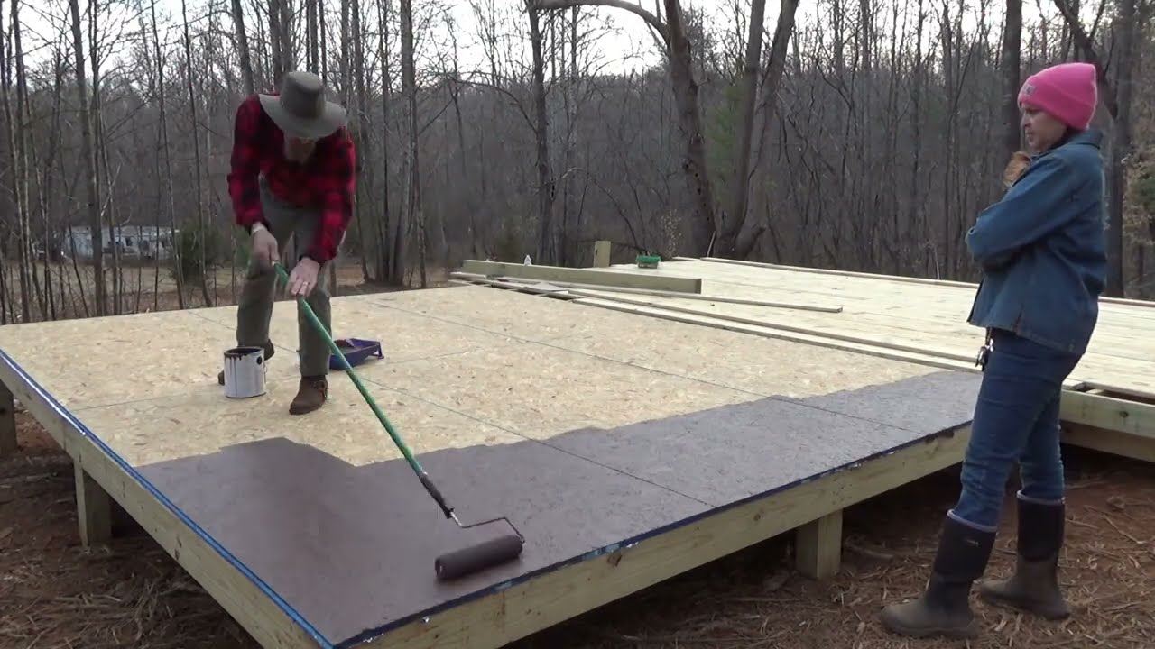 Our Off Grid Cabin Build: Waterproofing the OSB ahead of the Rain