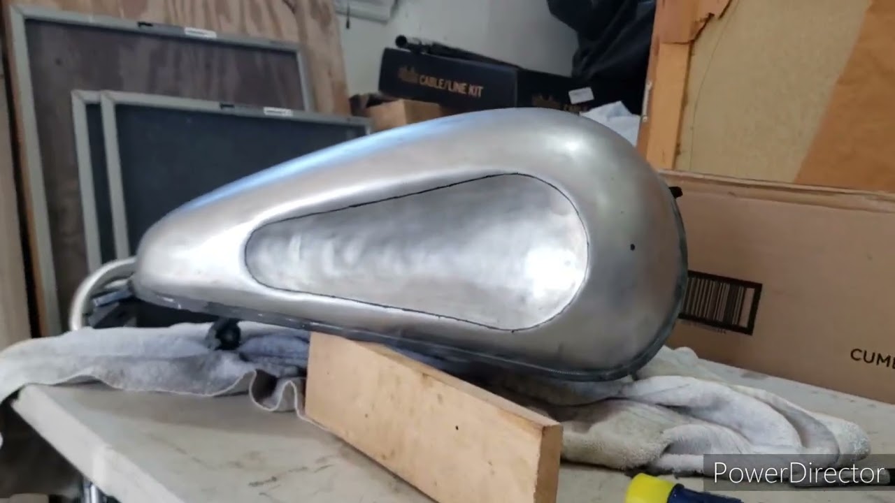 Dishing out a motorcycle tank.