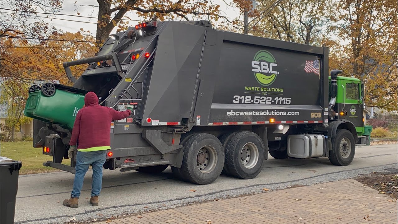SBC Waste Solutions 203: Mack MRU Heil DuraPack 5000 Rear Loader Garbage Truck