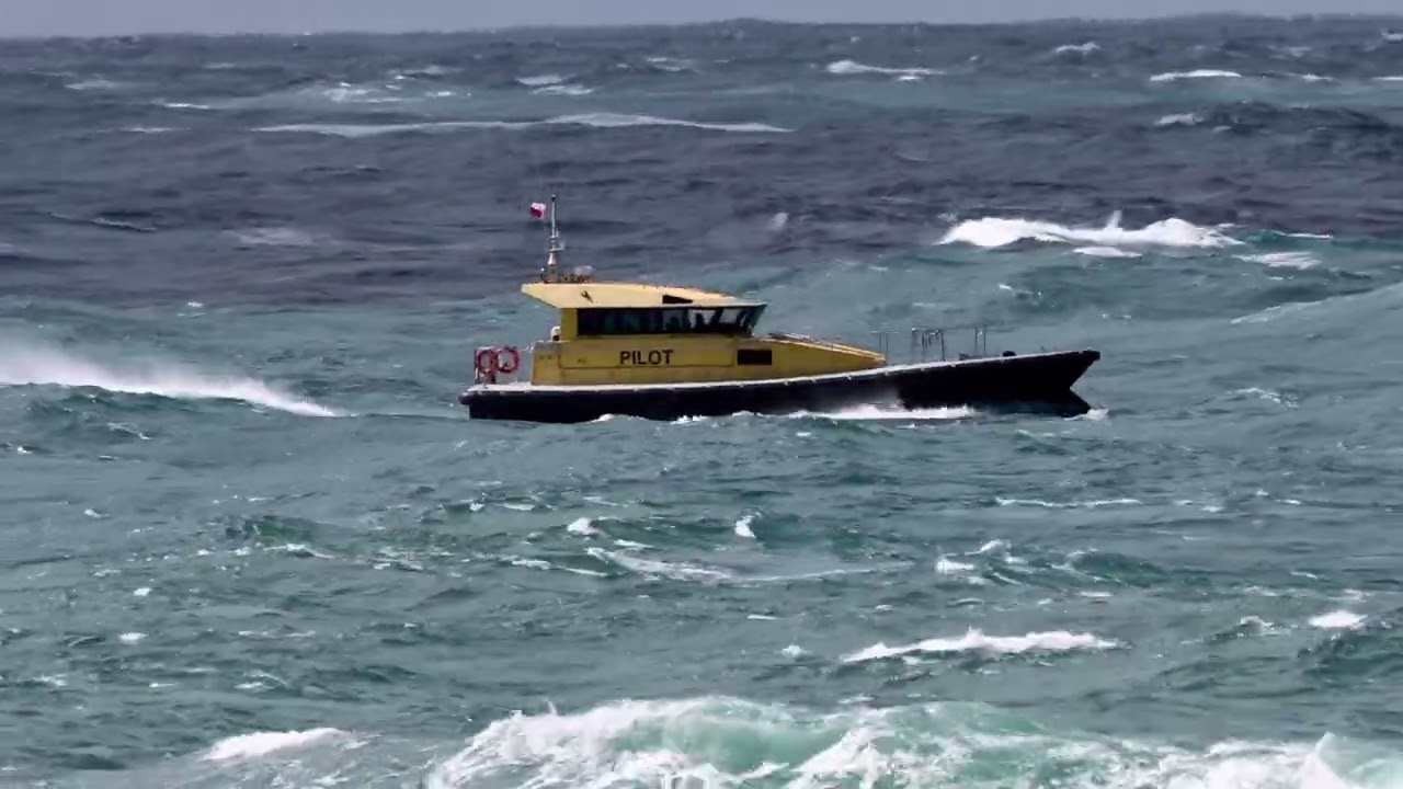 Pilot launch Griffiths out through the  