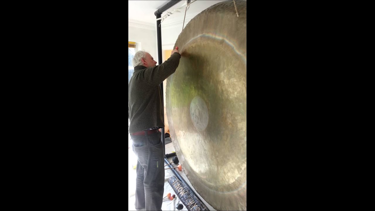 Bear Sound Testing Giant Gong for The Big Bang Experience