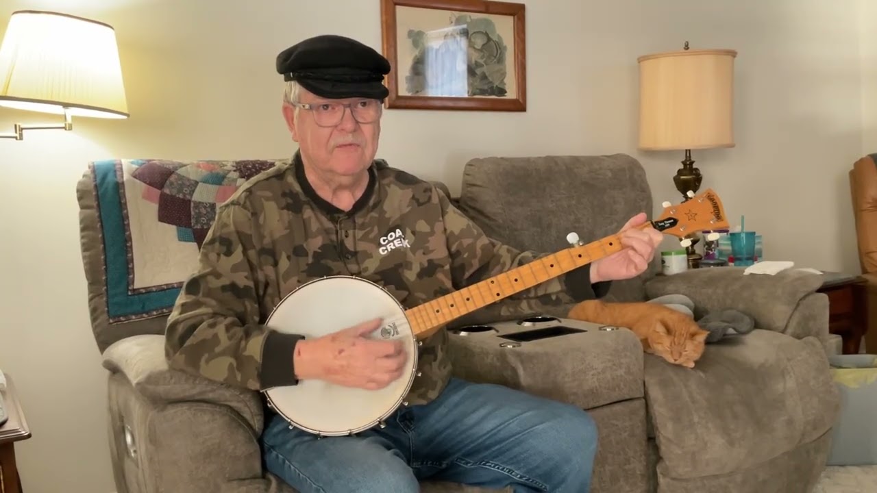 Over The Mountain - played/sung by Tony Thomas