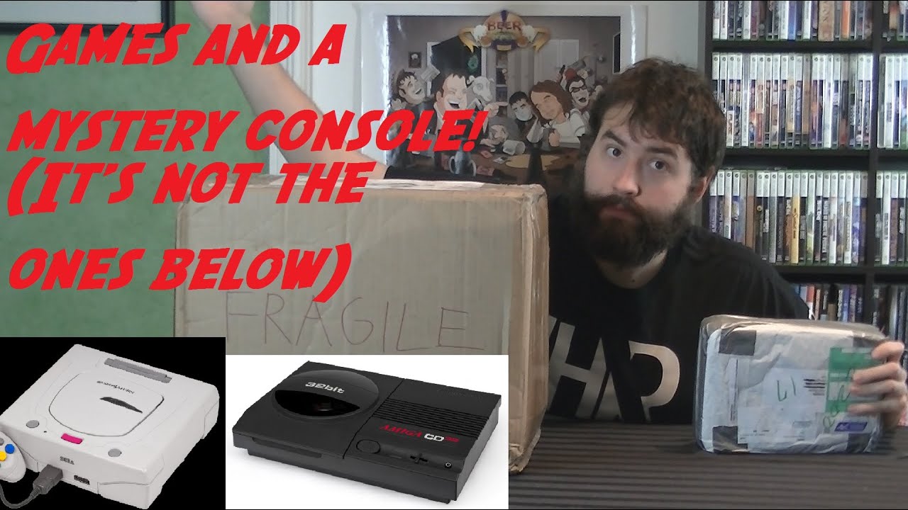 UnBoxing - Sega Saturn & Amiga CD32 Games + Mystery Console - Adam Koralik