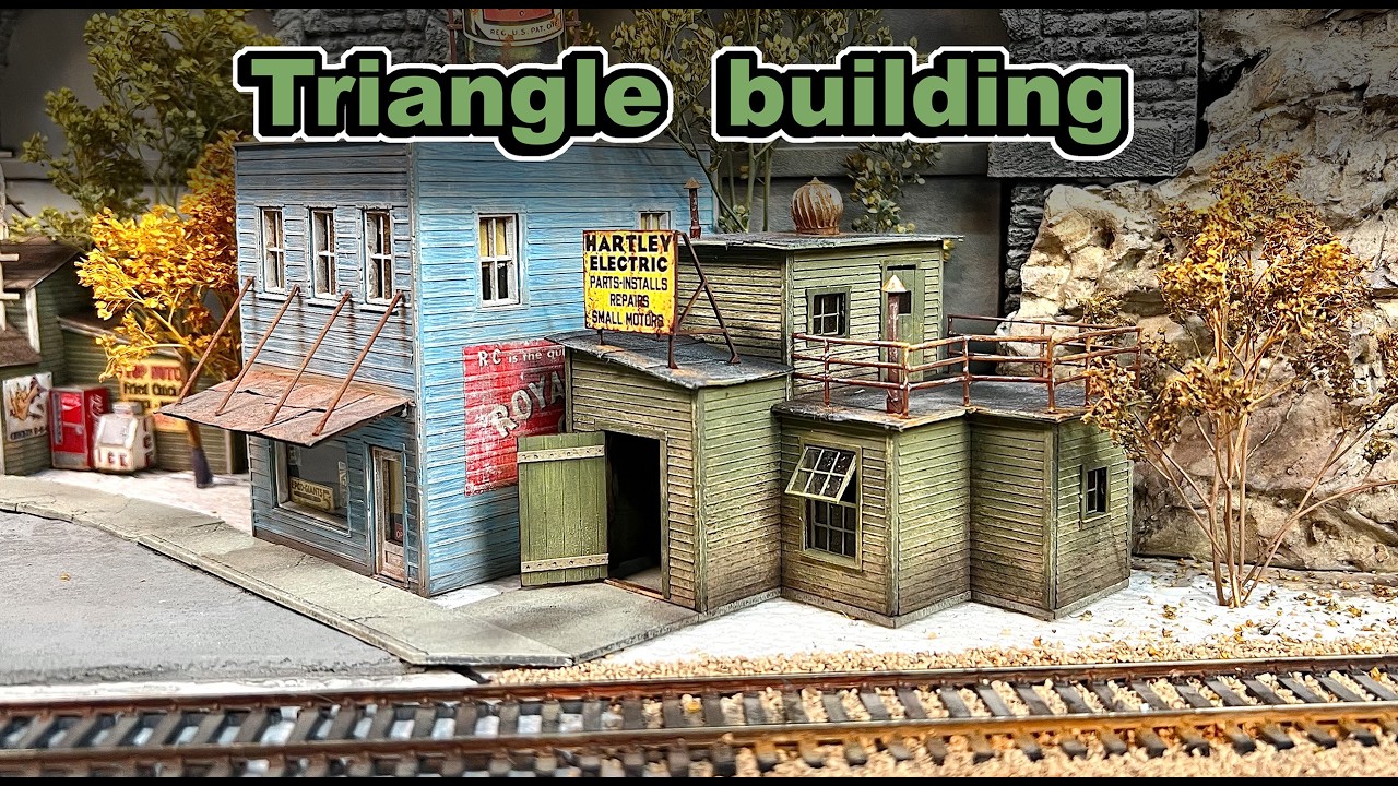 Adding a triangle shaped structure to our model railroad layout.