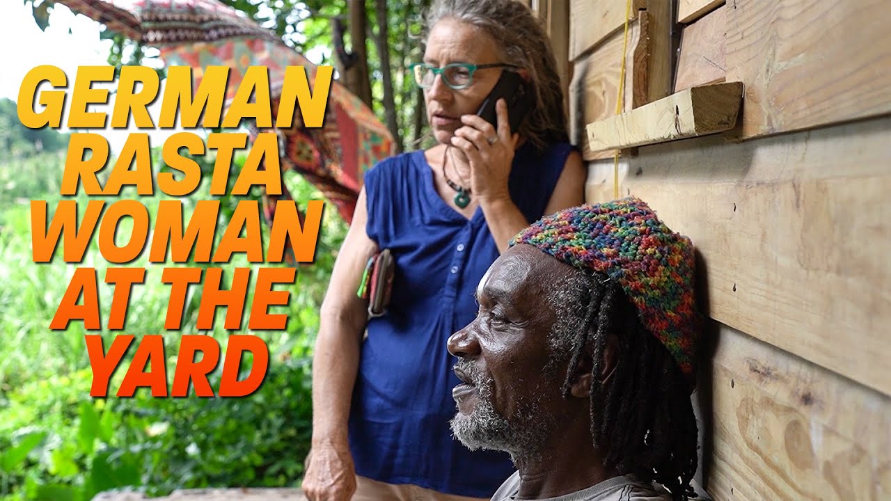 Female Rasta at the Yard & Spice shopping with Chucky