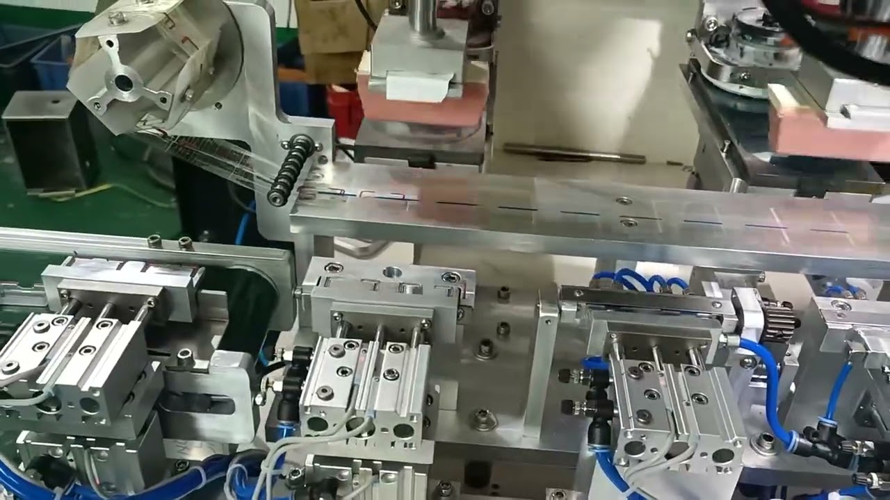 Auto 2 color pad printer with pad cleaning device