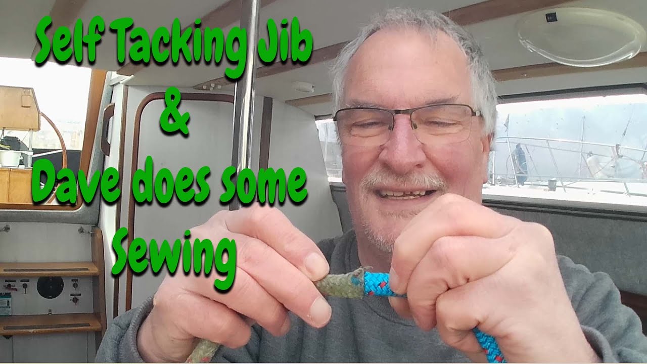 Preparations for sailing in 2025,  Dave does some sewing.  Part 2 of the self tacking jib instal.