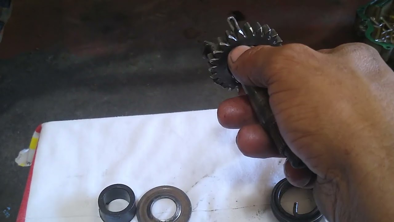 Esses são os componentes do eixo de partida da YBR:Como Trocar o Eixo de Partida da Yamaha YBR.
